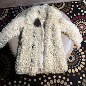 White long curly fur coat